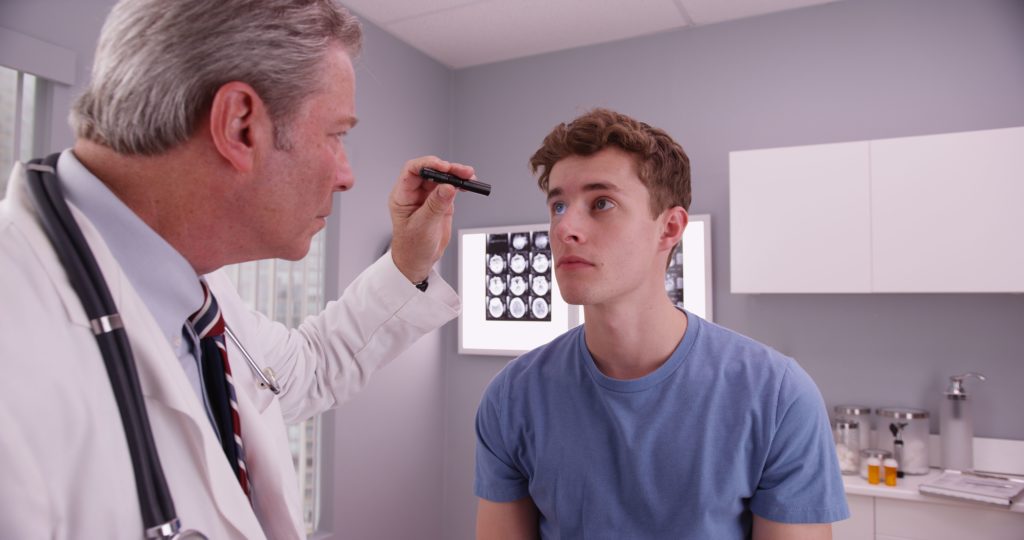 Doctor checking up on a patient